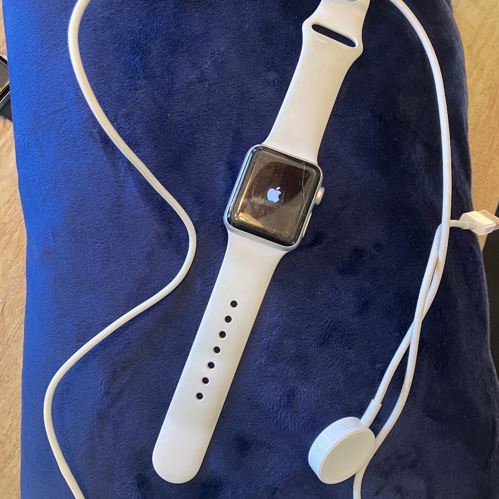 APPLE WATCH SERIES 3 WITH STRAP AND CHARGER, GOOD CONDITION has small scratch